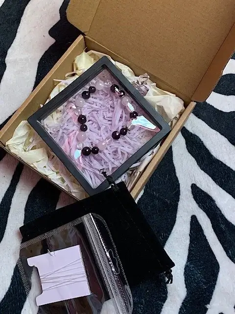 handmade jewelry unboxing with thoughtful packaging and ribbon